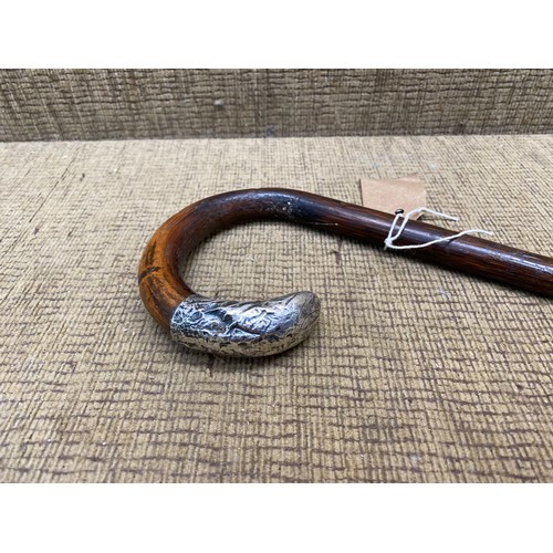 935 - Walking cane with sterling silver attchmnet to handle, hallmarks for London 1920.