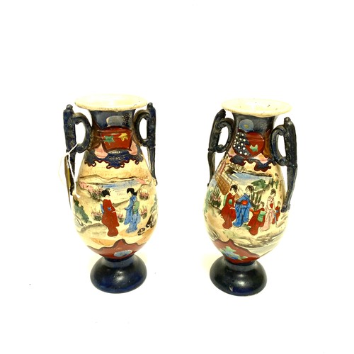 940 - Pair of hand painted Chinese/Japanese vases with ladies in the garden (see marks to base). 22cm.