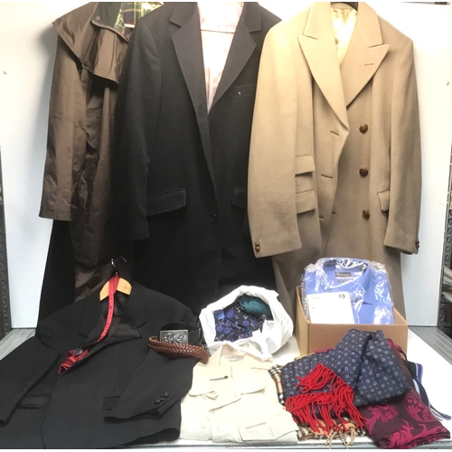293 - A selection of men’s clothes including retail packaged shirts, ties, scarves and coats