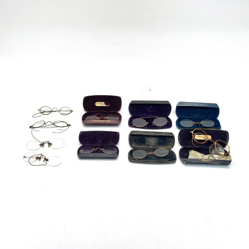 944 - Collection of vintage spectacles and cases.