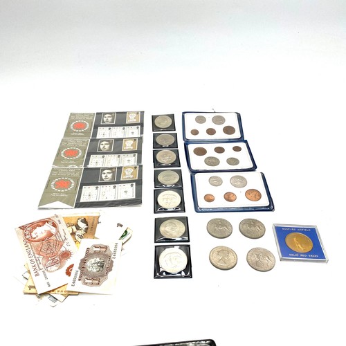 945 - Collection of commemorative coins, bank notes and stamps.