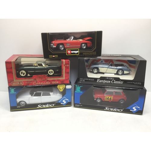 898 - Five die cast model cars including Burago, Mira, Ertl and Solido