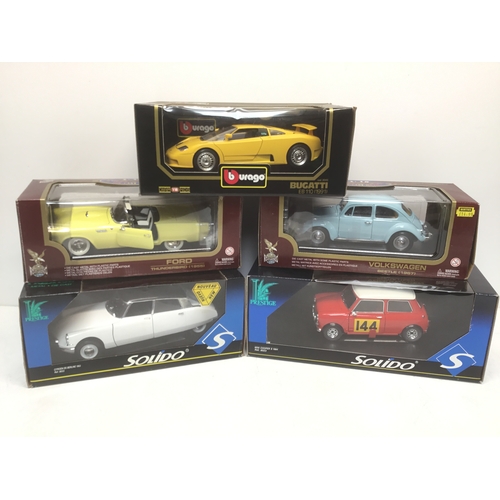 899 - Five die cast model cars including Road Legends, Solido and Burago