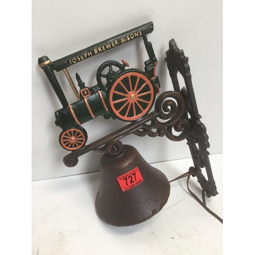 1358 - Cast metal wall mounted bell featuring a Joseph Brewer and Sons steamroller
