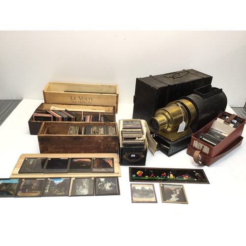 1371 - Antique paraffin magic lantern with a large amount of old slides