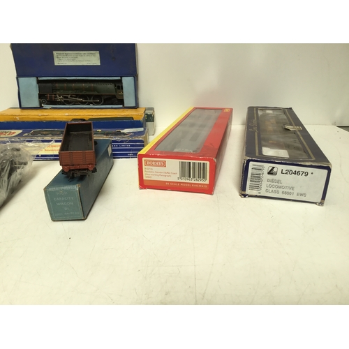 1168 - A selection of trains and carriages including Hornby Dublo Duchess of Montrose and Bristol Castle ED... 