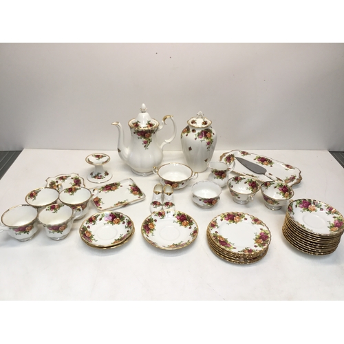 1373 - A quantity of Royal Albert Old Country Roses plates, teapot, cups and tray