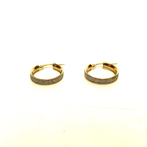 1194 - Pair of 9ct gold earrings, 1.7g