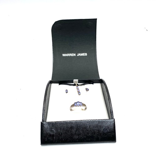 1214 - Sterling silver Tanzanite ring, earrings and pendant with chain set. 1.45ct and size U.