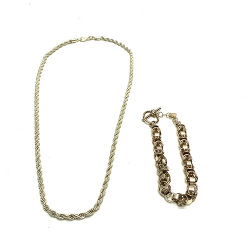 1216 - Silver chain link T Bar bracelet and heavy rope necklace.