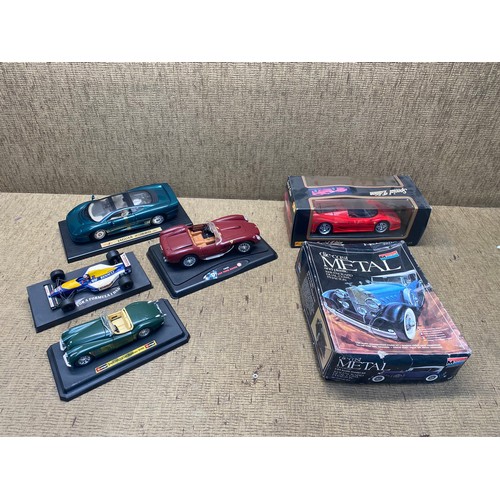 1306 - Collection of model cars including: Burago and monogram.