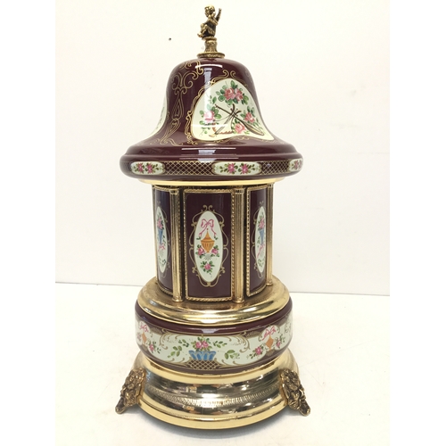 836 - Musical carousel cigarette storage box 34cm Reuge movement and decorated with gold leaf