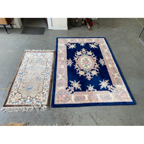 1334 - 2 Chinese hand made silk and wool rugs with floral pattern.