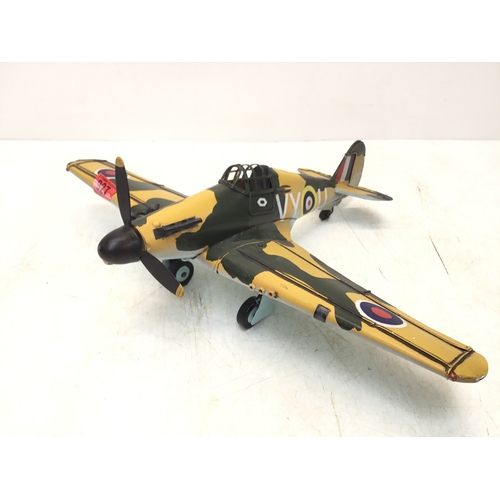 927 - Vintage metal WW2 plane with moving propellor