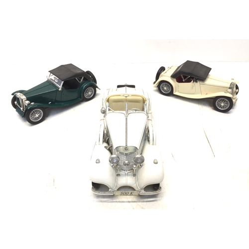 929 - Two Road Signature MG Midgets and a Maisto Mercedes Benz 500k model cars