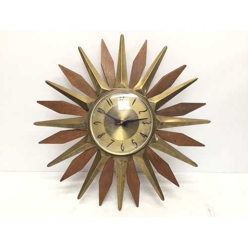 935 - 1970's Anstey & Wilson sunburst design wall clock, with Arabic numerals, 48cm in diameter