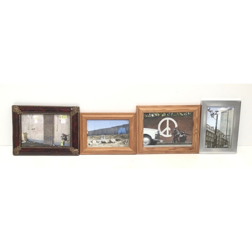 942 - Four small framed Banksy pictures