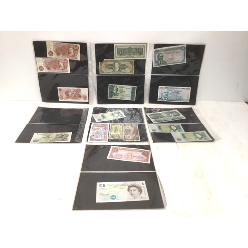 957 - A collection of vintage bank notes including an English five pound note