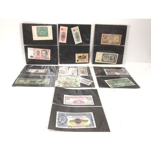 957 - A collection of vintage bank notes including an English five pound note