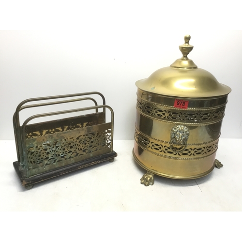 978 - Large brass coal store with lion head handles and a brass magazine rack