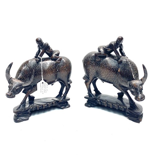 971 - antique chinese hand-carved hardwood water buffalo figurine ridden by men featuring silver wire inla... 