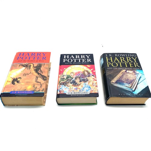 972 - 3 books of harry potter including the half-blood prince, the deathly hallows and the goblet of fire.