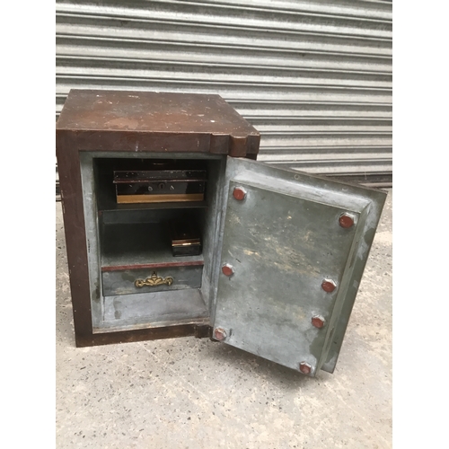1376 - Very heavy antique fire resistant safe with G Coopers invincible powder proof lock and key 40cm x 55... 