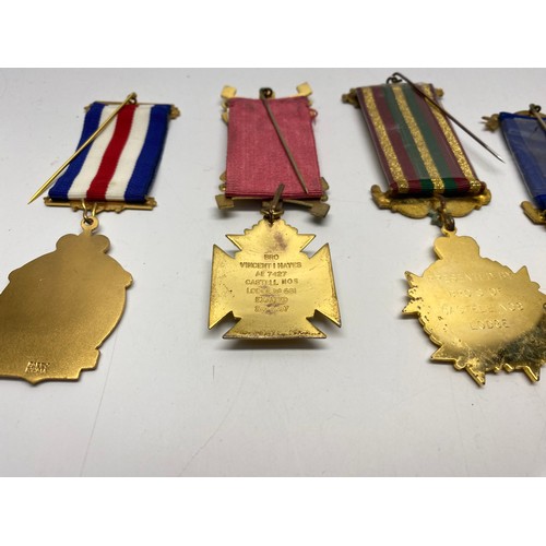 964 - Collectible items including Masonic medals, bird pin cushion and a brass 50 year calendar