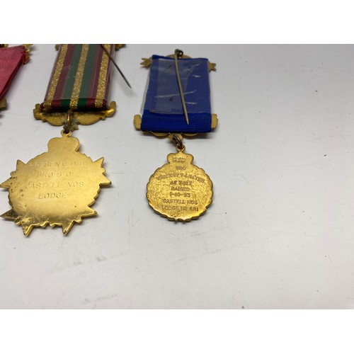 964 - Collectible items including Masonic medals, bird pin cushion and a brass 50 year calendar