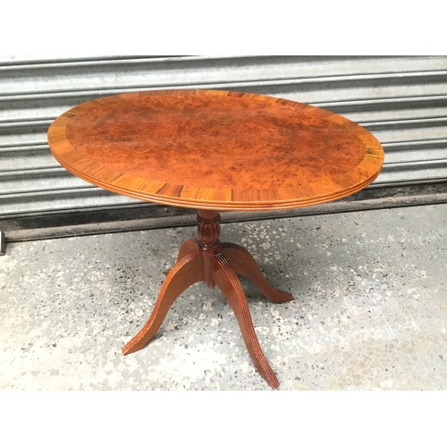 1050E - Vintage oval tilt top table with burr walnut finish circa 1970’s