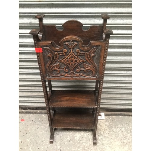 1050F - Antique arts and crafts craved magazine rack in oak