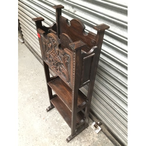 1050F - Antique arts and crafts craved magazine rack in oak