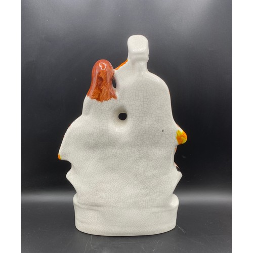 1392B - Antique Flatback figure of lady and gentleman upon a clock likely from 19th century.