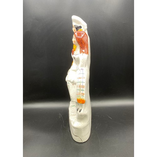 1392B - Antique Flatback figure of lady and gentleman upon a clock likely from 19th century.