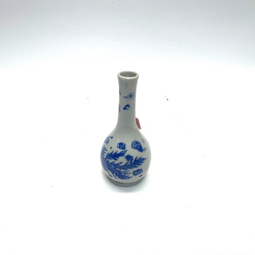 1012B - Antique Chinese blue and white porcelain bottle likely from the Qing dynasty 19th century with marks... 