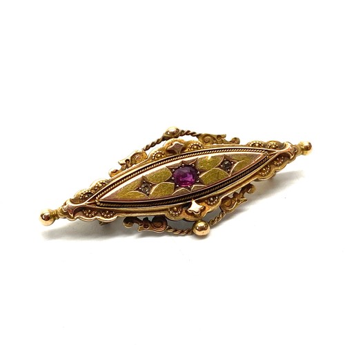 1238 - Stunning 15ct gold mourning art deco brooch with ruby encrusted into the centre.