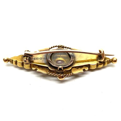 1238 - Stunning 15ct gold mourning art deco brooch with ruby encrusted into the centre.