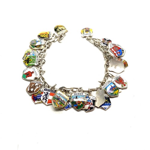 1248 - Continental Silver Braclet with Approximately 30 charms from Germany.