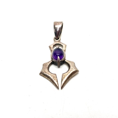 1019 - large silver pendant with amethyst stone.