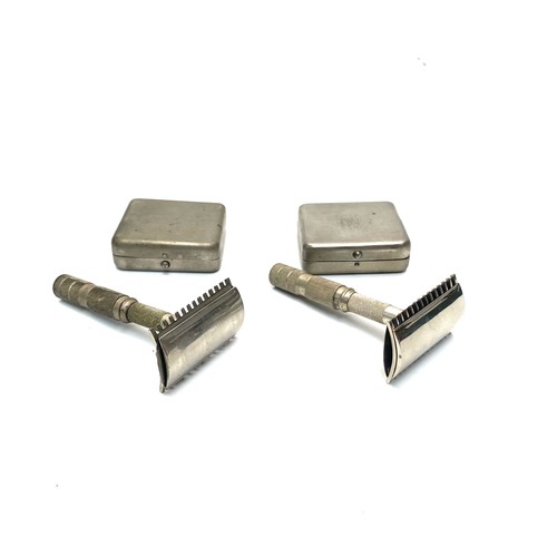 1023 - 2 simplex travelling razors in velvet lined box.