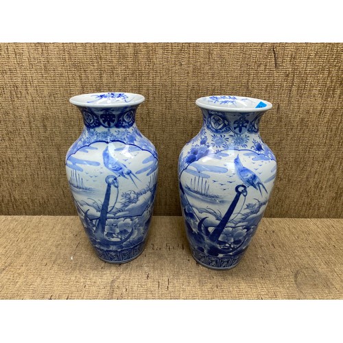 1388A - Pair of chinese blue and white porcelain vase created vase features a bird and a anchor backdrop of ... 
