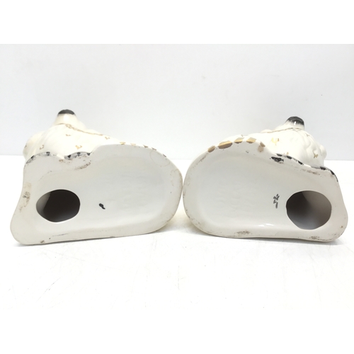 827 - A pair of Beswick fireside dogs 23cm