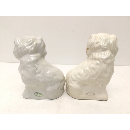 852 - A pair of Beswick fireside dogs 14cm