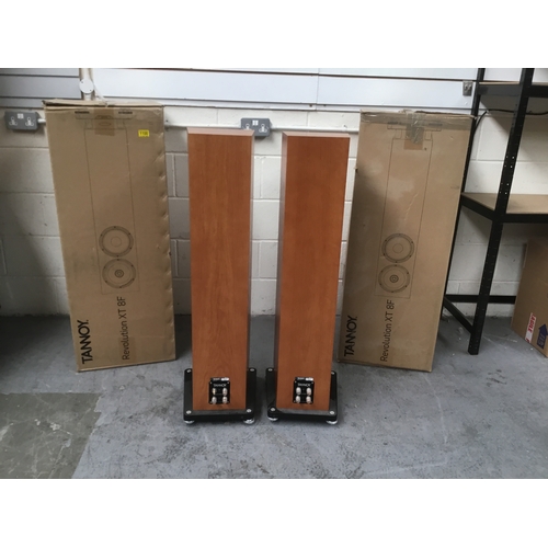 1100 - A pair of Tannoy Revolution XT 8F floor speakers with retail packaging