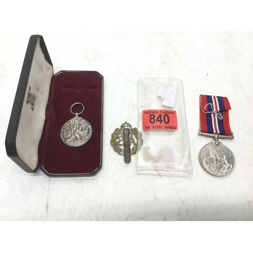 840 - Boxed Imperial Service Medal, War Medal and a Women’s ATS cap badge