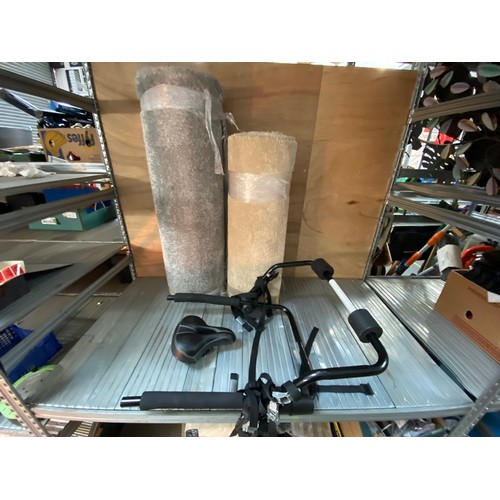 266 - 2 rolls of carpet (grey and Beige) and a bike rack