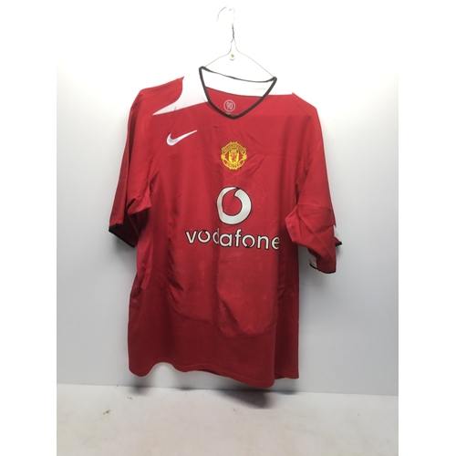 281 - Manchester United home shirt from 2004-2006 with Smith to the rear and number 14 (faded) size L