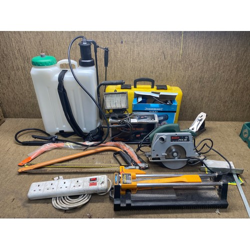 287 - Large mixed tools including: Hot air gun, 135w sander, bow saws and bosch circular saw.