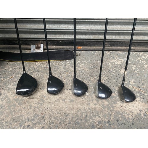 44 - Collection of left-handed golf clubs, including Skymax Solar Iron plus golf bag.