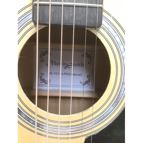 318 - Acoustic guitar by Martin Smith with guitar stand